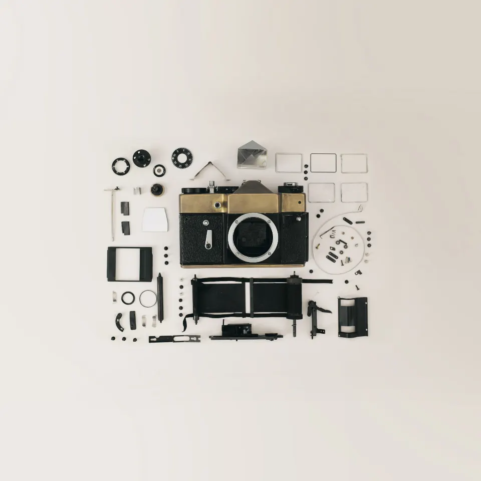 Vintage camera and accessories laid out on a table